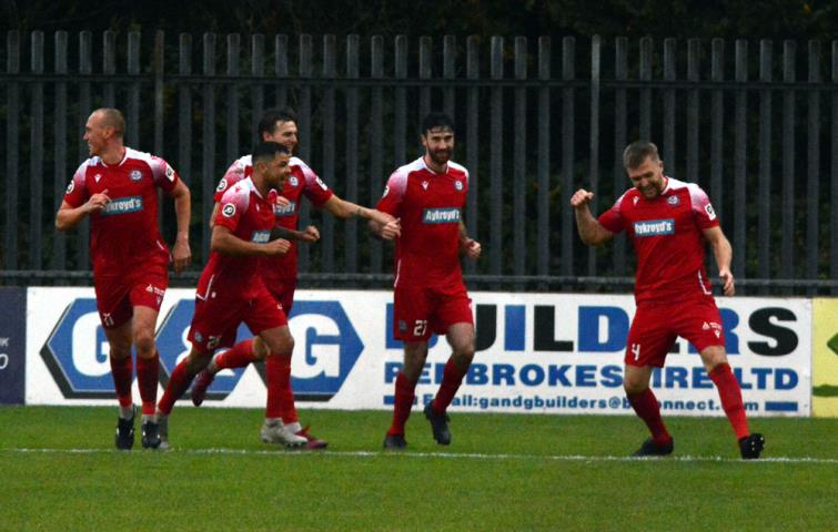 Nathan Peate celebrates second goal for Bala Town